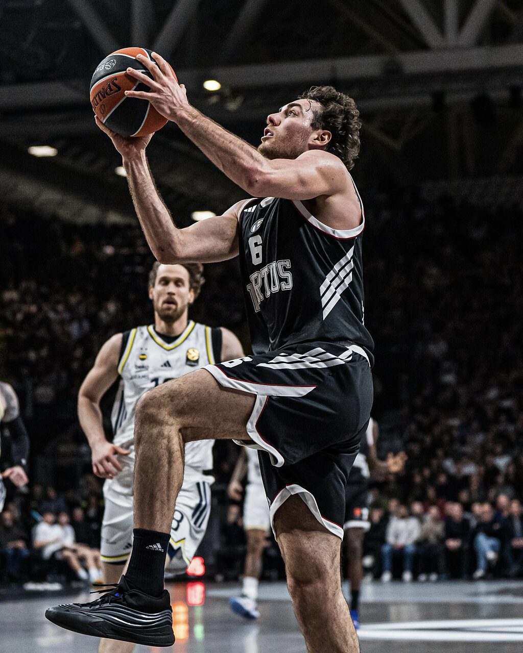 Alessandro Pajola in azione con la Virtus
